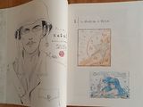 a drawing of a man in a hat and a drawing of a woman in a hat