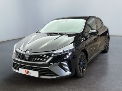 the front view of a black car parked in a white room