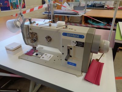 a sewing machine that is sitting on a table