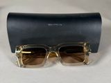 a pair of sunglasses sitting on top of a black case