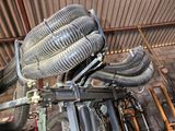 a machine that has a bunch of pipes attached to it