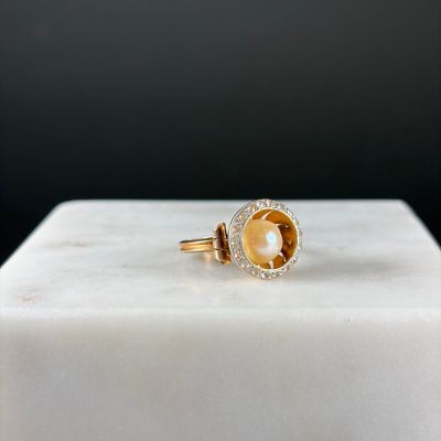 Bague en or jaune et or gris 750/1000 (18K) ornée en son cen…