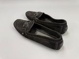 pair of men ' s black sued driving shoes on a white surface