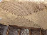 an image of a wicker bed with a wooden frame