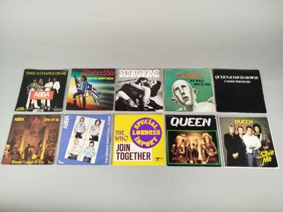 a lot of different cd ' s on the table