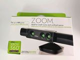 a zoom webcam sitting on top of a box