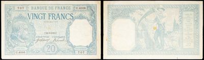 a close up of two different types of currency on a white background
