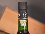 a bottle of wine that is sitting on a table
