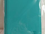 une photo d'un classeur bleu posé sur une table blanche