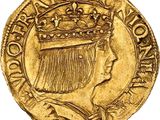 une pièce d'or surmontée d'une couronne