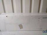 a box that is sitting on the floor next to a radiator