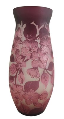 purple glass vase with flowers and butterflies on it on a white background