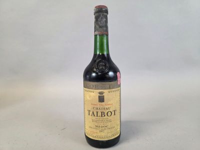a bottle of wine that is sitting on a table