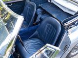 a view of the inside of a car from the driver ' s seat