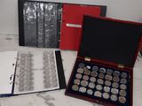 a lot of silver coins in a case on the counter