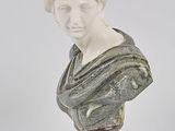 marble bust of a woman with a shaw around her neck