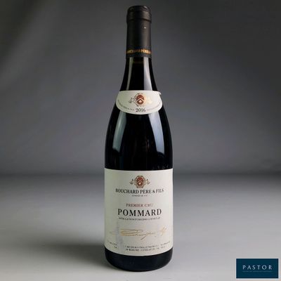 a bottle of wine that is sitting on a table