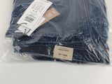 the blue shirt is wrapped in plastic and ready to be shipped