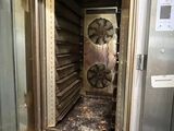 an image of a commercial oven with a lot of food inside of it