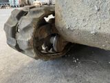 a close up of a tractor tire on the ground