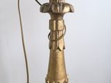 a lamp that is sitting on a table with a light on it