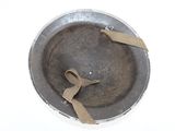 a metal bowl with a brown ribbon on it