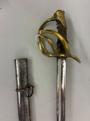 two swords that are on display on a table
