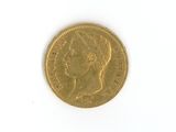 an image of a gold coin with a woman ' s face on it