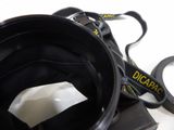 a close up of a camera lens and a camera strap