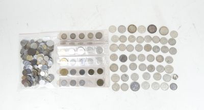 a lot of coins in a plastic bag on the table