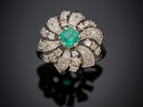 an emerald and diamond ring