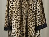 an image of a leopard print coat on a mannequin mannequin