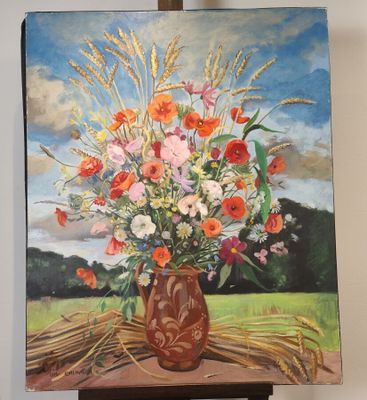 une peinture de fleurs dans un vase sur un chevalet