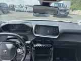 a dashboard of a car with a lot of cars in the background