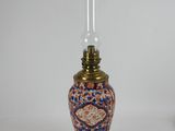 pair of antique chinese vases with glass lamps on stands