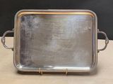 silver plated serving tray with handles and handles on a table