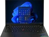 l'ordinateur portable est ouvert sur une surface blanche avec un fond bleu