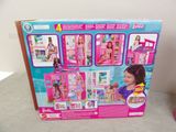barbie doll house with furniture and accessories for sale in a box