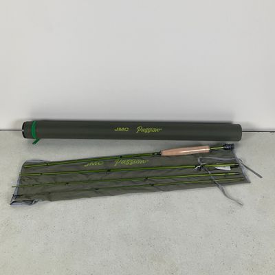 a green and black fly rod next to a green and black fly rod