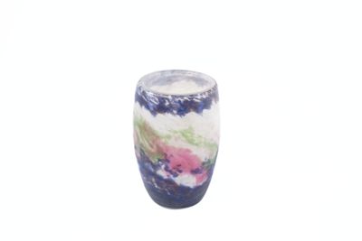 a vase that has a colorful design on it