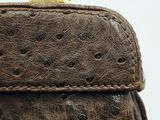 brown ostrich leather handbag with gold clasp