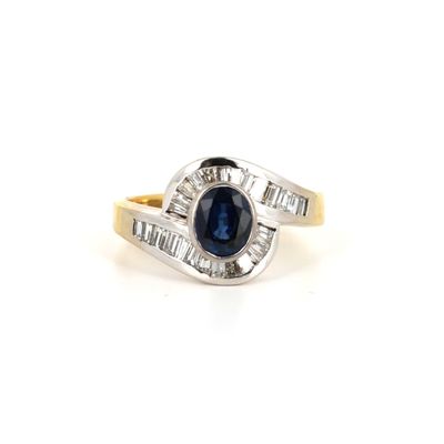 an image of a sapphire and diamond ring on a white background