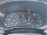 a close up of a car dashboard with a speedometer and gauges