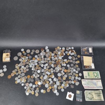 some of the coins are scattered on the table and there is a picture of them