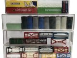 many different types of toy trains on the shelves