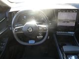 the interior of a car with the sun shining through the windshield
