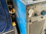 a machine that is sitting on the floor in a room