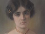 portrait of a woman in a white dress with a red necklace