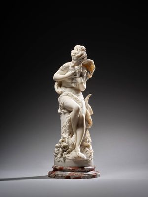 an image of a statue of a woman holding a flower