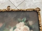a picture of a painting of flowers in a gold frame